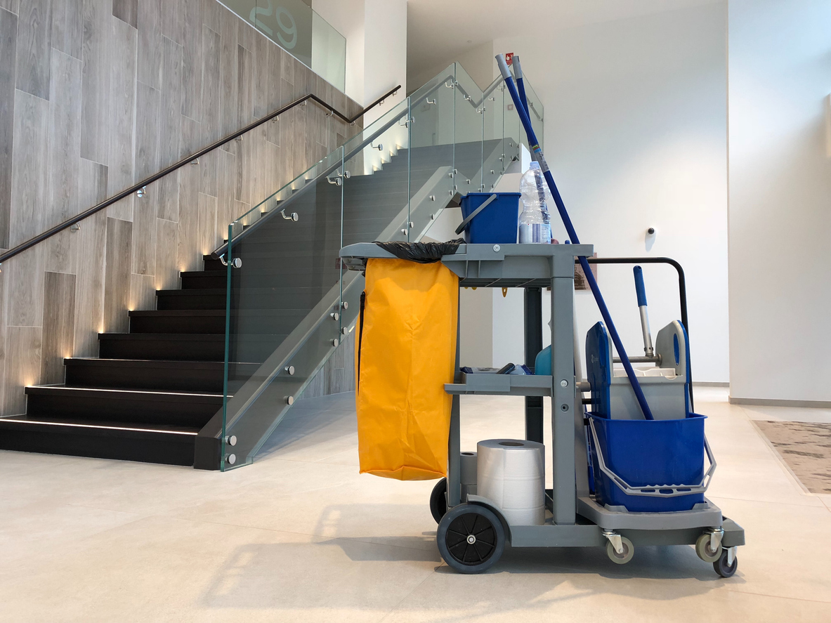 Cleaning cart in the entrance hall of an apartment building